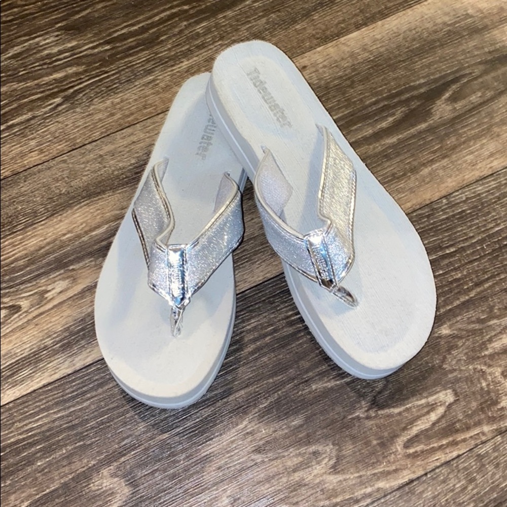 Tidewater silver flip flops